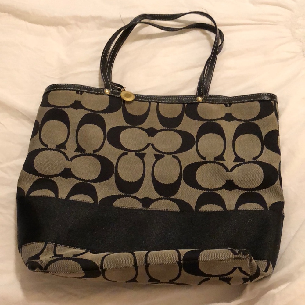 Black and white signature print Coach tote